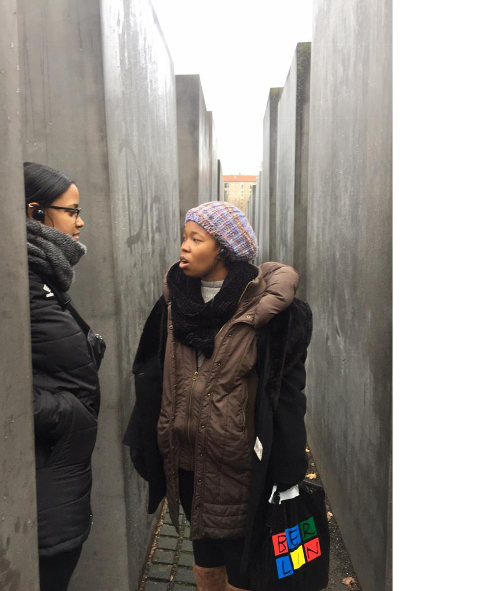 Two students in the midst of the Memorial to the Murdered Jews of Europe, Berlin.